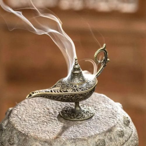 4 Aladdin Magic Lamp Incense Burner Bring a touch of magic to your space. This genie lamp–inspired burner creates a swirling smoke effect and adds charm to any room. Perfect for cone incense and mindful moments.
