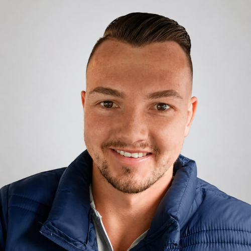 Christiaan Enlin, Biokineticist at Meraki in Motion, standing in a clinical wellness environment