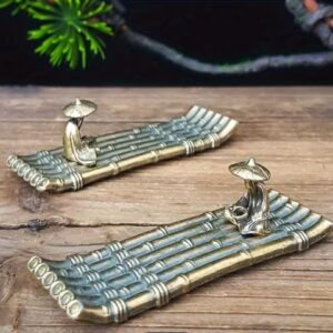 Small boat incense holder with minimalist linear design, decorative incense stick stand and ash catcher for meditation, yoga, aromatherapy, spiritual practices, and modern home décor.