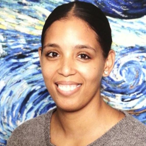 Professional portrait of Mariel Martin, Registered Counsellor and Certified Life Coach at Meraki in Motion Wellness Centre.